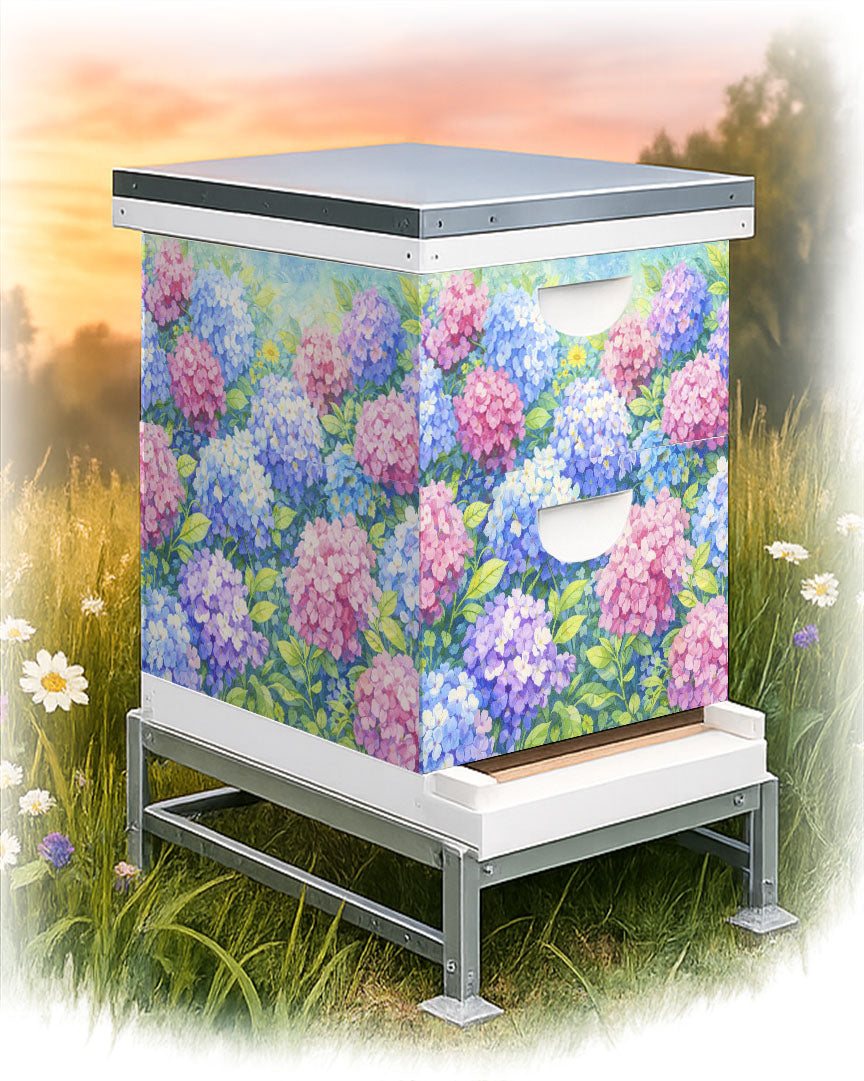 Beehive with floral design on a grassy background